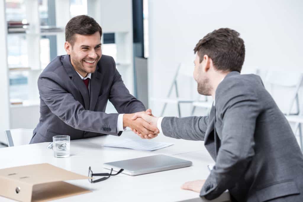 talent acquisition meeting handshake
